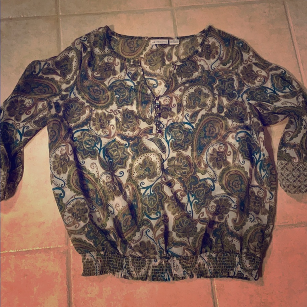 Green/ Teal see-trough shirt.